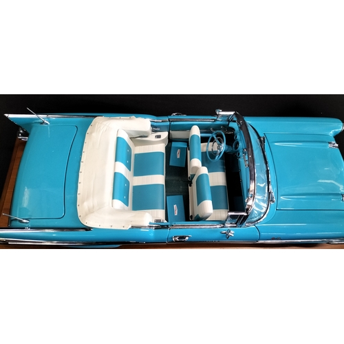 85 - Danbury Mint model of The 1957 Chevrolet Bel Air Convertible in Tropical Turquoise No 8 on wooden ba... 