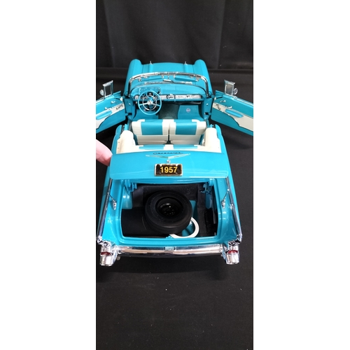 85 - Danbury Mint model of The 1957 Chevrolet Bel Air Convertible in Tropical Turquoise No 8 on wooden ba... 