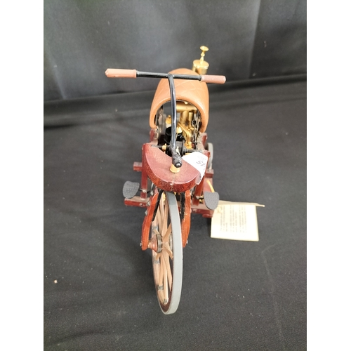 88 - Franklin mint 1:8 scale model of a 1885 Daimler Motorcycle