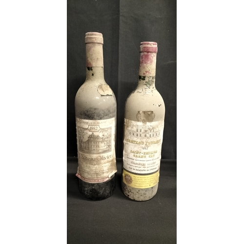 104 - Two bottles of unopened red wine,  1982 Chateau Oliver and 1982 Chateau Fourney