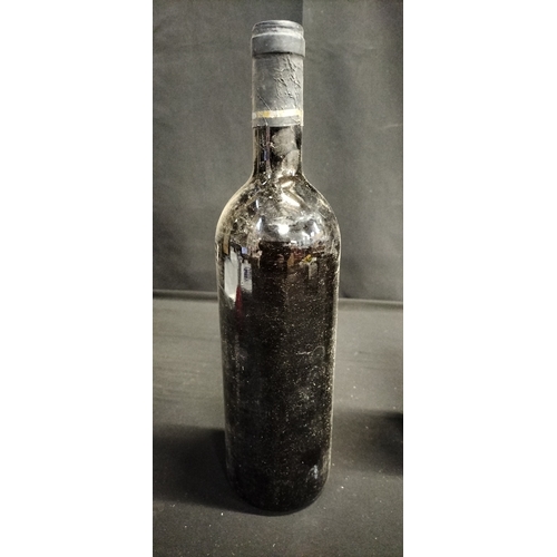 116 - Two bottles of unopened red wine. 1980 Tolomei