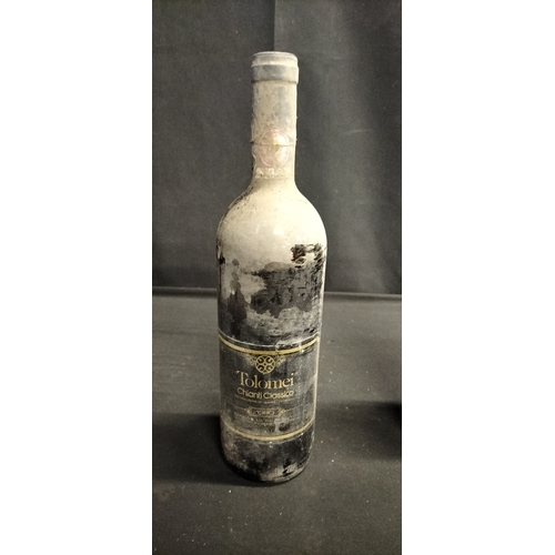 116 - Two bottles of unopened red wine. 1980 Tolomei