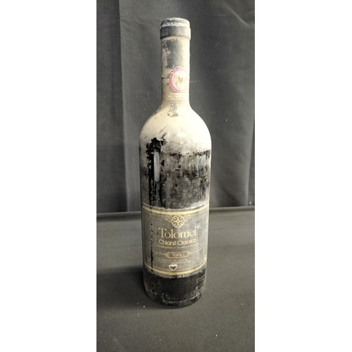 119 - Two unopened bottles of red wine. Bottle of 1980 Tolomei Chianti Classico and a bottle of Finest Mad... 