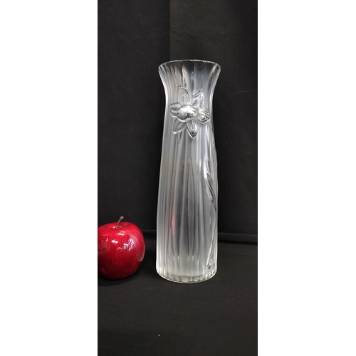 133 - Lalique tall vase in the daffodil design. Measures approx H 27 x W 8.5 cm