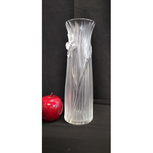 133 - Lalique tall vase in the daffodil design. Measures approx H 27 x W 8.5 cm