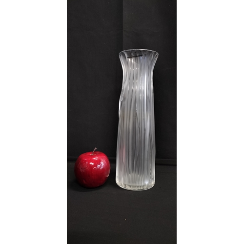 133 - Lalique tall vase in the daffodil design. Measures approx H 27 x W 8.5 cm