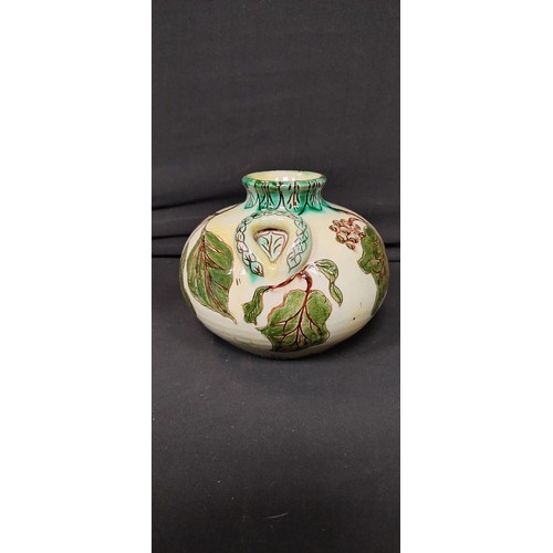 135 - Della- Robbia Co Ltd. 1896 Liza Wilkins, posey vase measures approx H 11 x W 6 in a leaf design