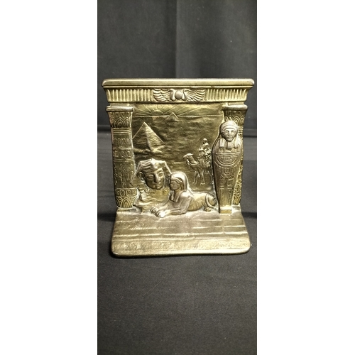 136 - Pair of cast metal Egyptian bookends features Sphinx, mummy and pyramid. Measures approx H 13.5 x W ... 