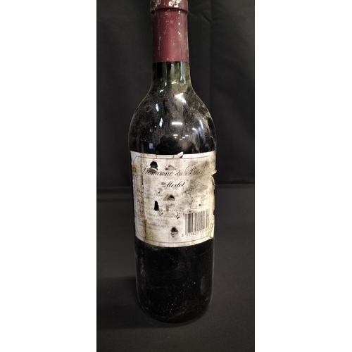 145 - Unopened bottle of 1996 Mis En Bouteille Au Domine. Merlot