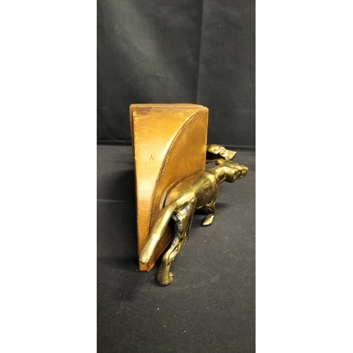 229 - Pair of Brass dog and leatherette book ends.