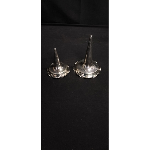 231 - Two silver plated candelabra candle inserts