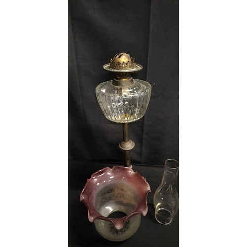 246 - Vintage glass oil lamp with pink rimmed etched shade. Measures approx H 77 x W 22.5 cm