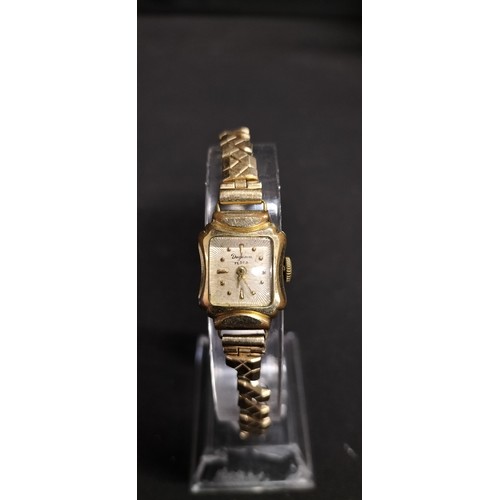 13 - Vintage Dugena festa Gold plated ladies dress watch with stretch strap