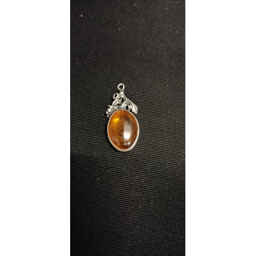 21 - Sterling silver and amber pendant measures approx 2.5 x 1 inch