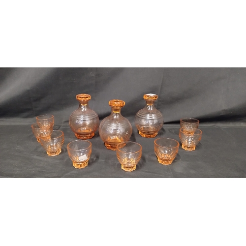 252 - 1940's French art deco peach decanters and 8 glasses