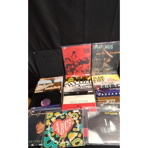 434 - Large quantity of vinyl albums including Bruce Willis, Slade, Julio Iglesias and other artists and g... 