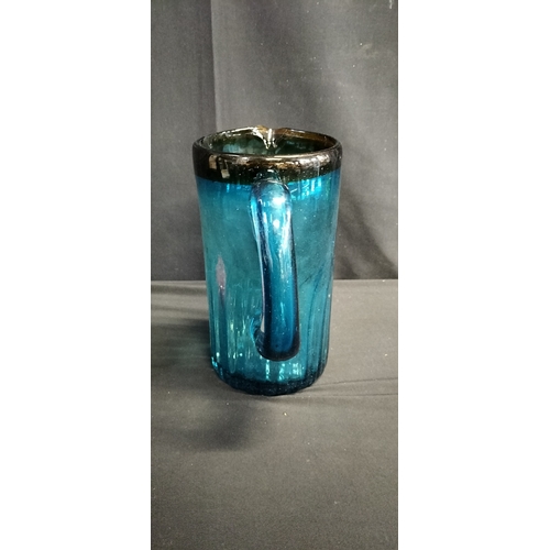 166 - Mid century hand blown blue tall pitcher jug with amber colour glass to the rim. Measures approx H 2... 