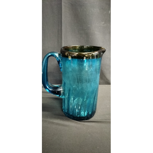 166 - Mid century hand blown blue tall pitcher jug with amber colour glass to the rim. Measures approx H 2... 