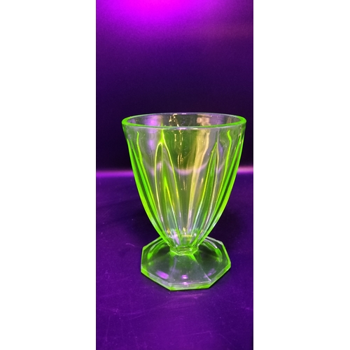 167 - Two art deco uranium glass glasses. Measures approx 12 x 9 cm