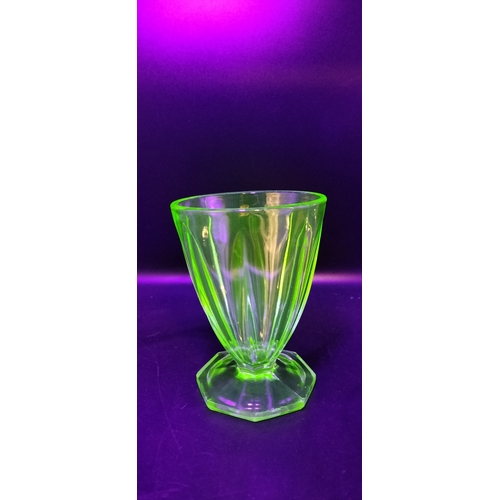 167 - Two art deco uranium glass glasses. Measures approx 12 x 9 cm