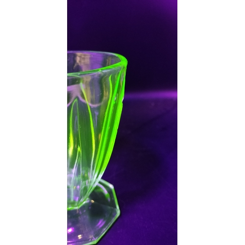 167 - Two art deco uranium glass glasses. Measures approx 12 x 9 cm