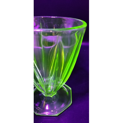 167 - Two art deco uranium glass glasses. Measures approx 12 x 9 cm