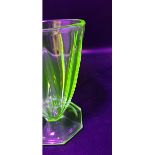 167 - Two art deco uranium glass glasses. Measures approx 12 x 9 cm