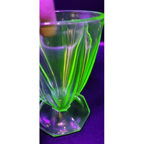 167 - Two art deco uranium glass glasses. Measures approx 12 x 9 cm