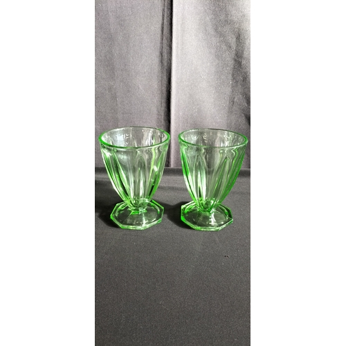 167 - Two art deco uranium glass glasses. Measures approx 12 x 9 cm