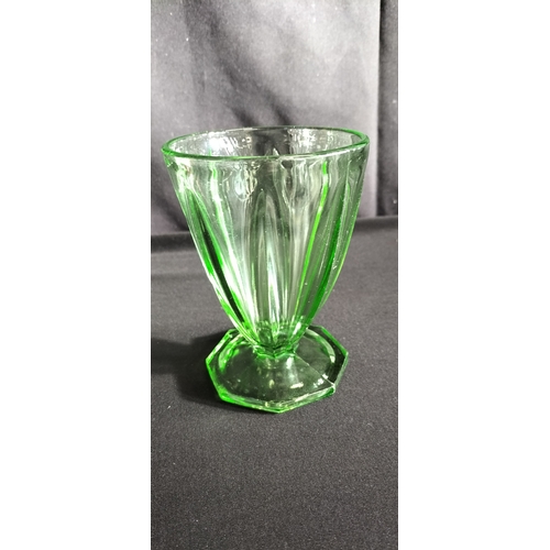 167 - Two art deco uranium glass glasses. Measures approx 12 x 9 cm