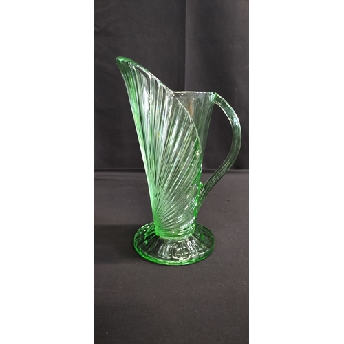 187 - Art deco Bagley green glass 1939 sunburst design pitcher jug. Measures approx H 24 x 15.5 cm