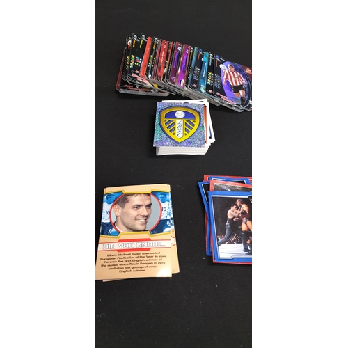 189 - Collection of various football, WWE/F stickers, tops trumps card for star wars and James bond