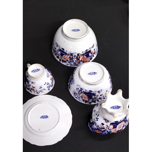 229 - 18 pieces of William Lowe China Tea Set. Side plates cups, sugar bowl milk jug and bowl