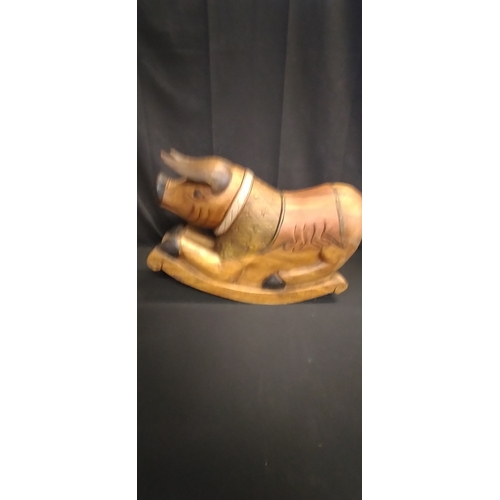 298 - Solid Wood carving of a rocking pig hand made in Thailand. Measures approx H 40 x 60 cm