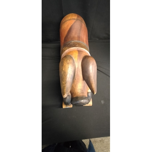 298 - Solid Wood carving of a rocking pig hand made in Thailand. Measures approx H 40 x 60 cm