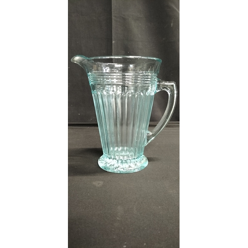 51 - vintage Pale blue glass pitcher jug. Measures approx 20 x 19.5 cm