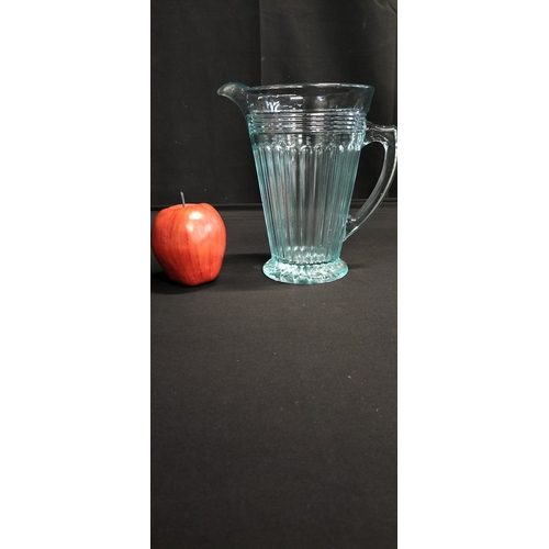 51 - vintage Pale blue glass pitcher jug. Measures approx 20 x 19.5 cm