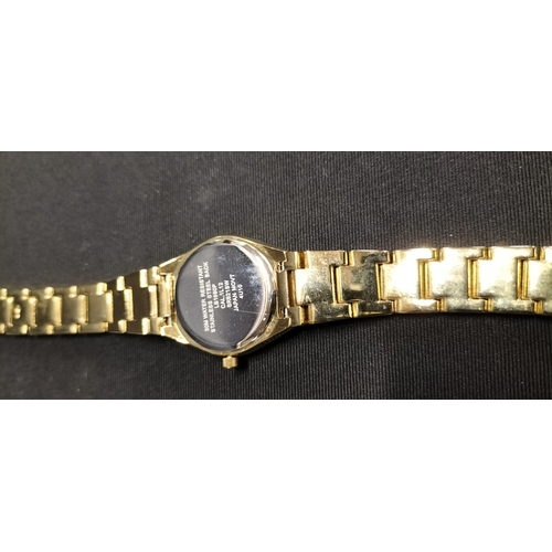 70 - Ladies Accurist gold plated watch with mother of pearl face and crystal bezel