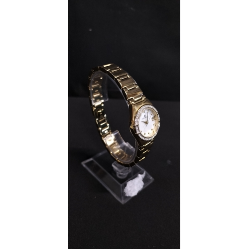 70 - Ladies Accurist gold plated watch with mother of pearl face and crystal bezel