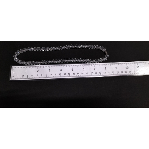 75 - Faceted crystal necklace with magnetic clasp. Measures approx 8 inch length