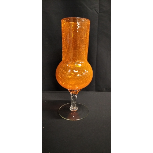 81 - Large hand blown orange crackle effect vase with clear glass foot