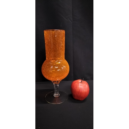 81 - Large hand blown orange crackle effect vase with clear glass foot