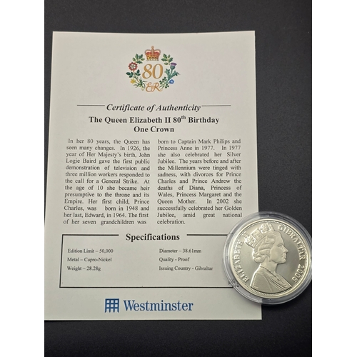 32 - Queen Elizabeth II 80th Birthday One Crown coin.  Limited edition 1 of 50,000
Weight 28.28g
Diameter... 