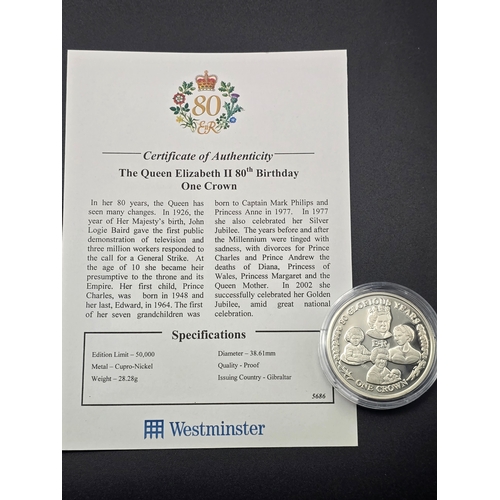 32 - Queen Elizabeth II 80th Birthday One Crown coin.  Limited edition 1 of 50,000
Weight 28.28g
Diameter... 