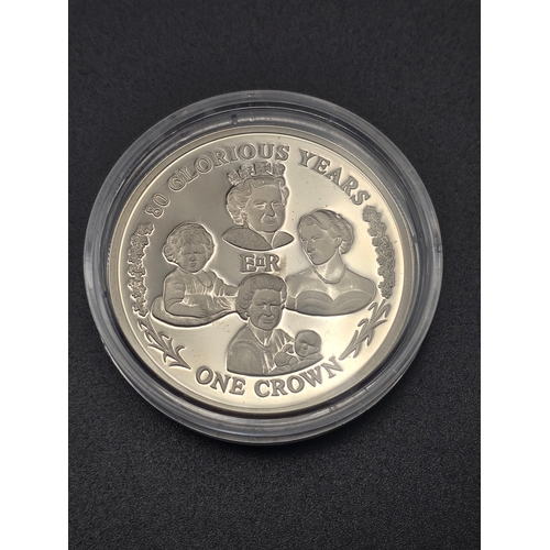 32 - Queen Elizabeth II 80th Birthday One Crown coin.  Limited edition 1 of 50,000
Weight 28.28g
Diameter... 