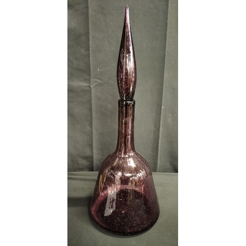 82 - Large Amethyst colour glass bell shaped decanter. Measures approx 55.5 x 21 cm