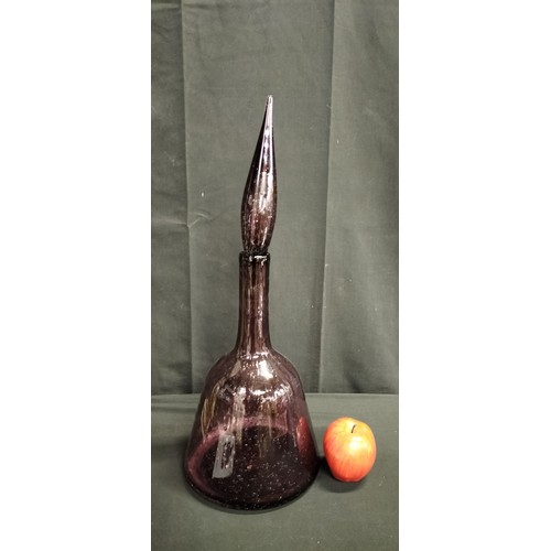 82 - Large Amethyst colour glass bell shaped decanter. Measures approx 55.5 x 21 cm