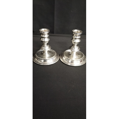 98 - Pair of Mappin and Webb White metal weighted candle holders. Measures approx  11.5 x 11 cm. Weight a... 