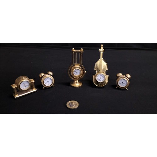 115 - Five miniature clocks various designs and makes