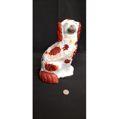 219 - Possible Staffordshire pottery style mantle dog in the form of a king Charles spaniel